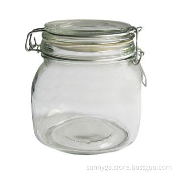 Glass candle jar with clip lid